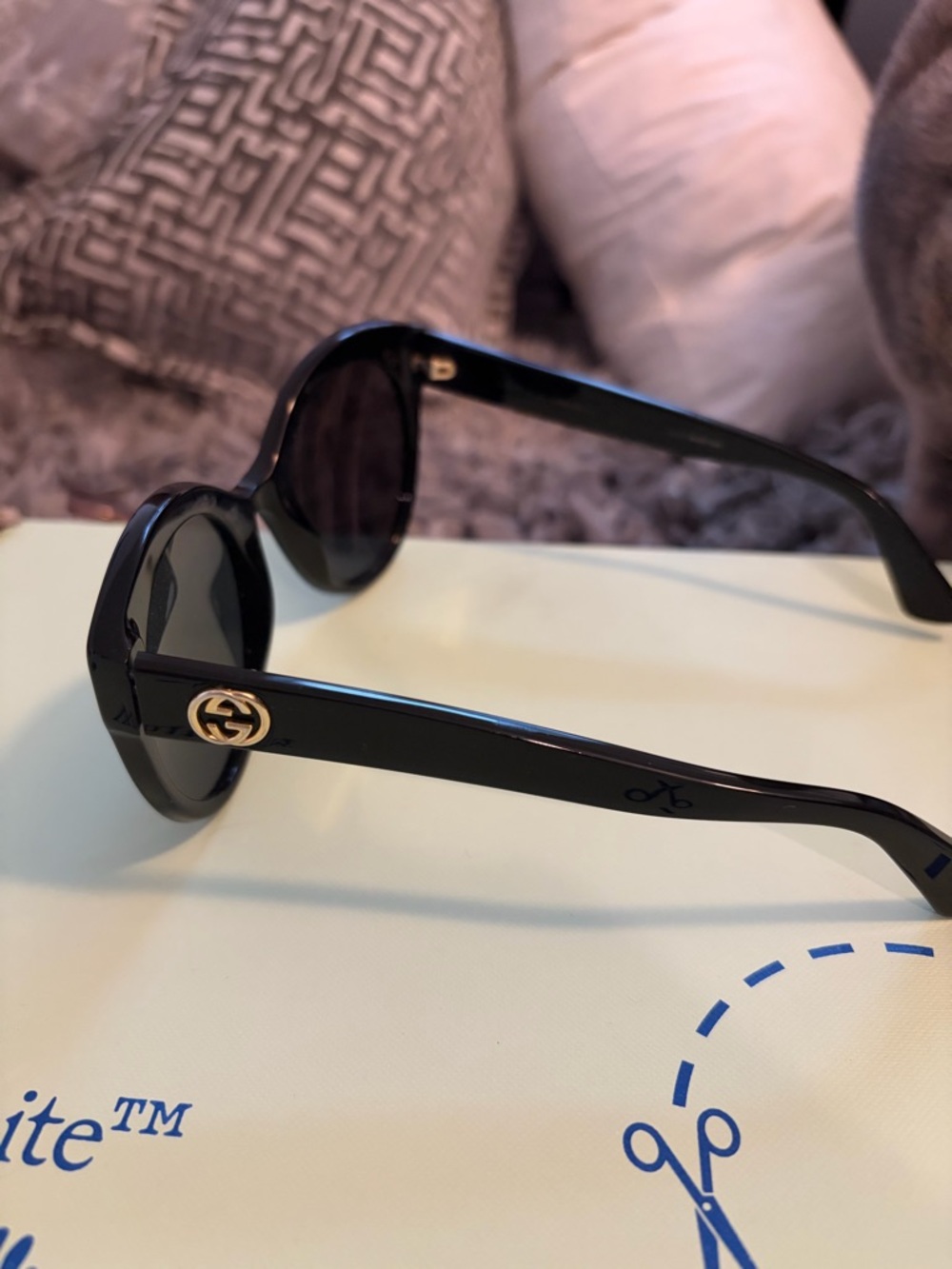 Gucci Black Round Sunglasses with Gold GG Accent